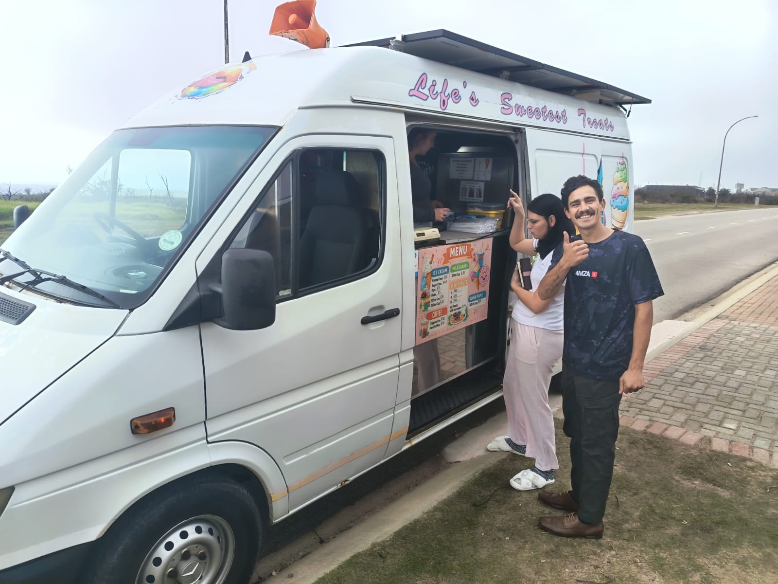 Happy customer giving a thumbs up