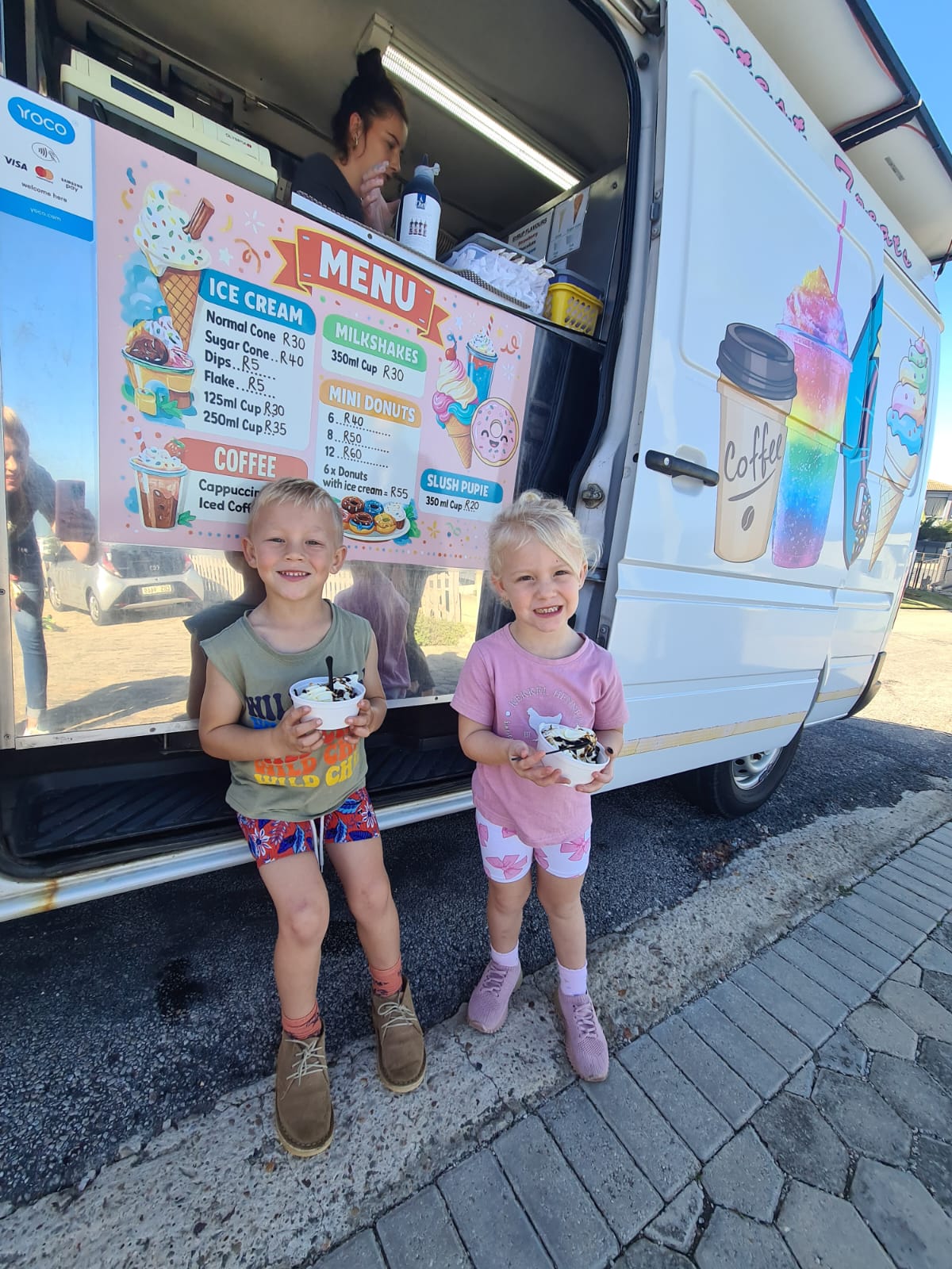 Happy kids enjoying ice cream at the LekkerLicks van
